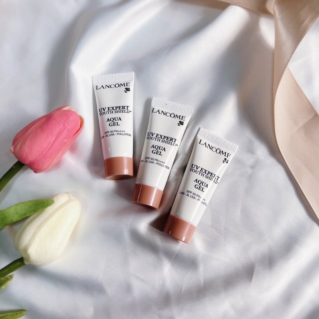 Lancome small white tube sunscreen milk sample