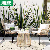 Outdoor table and chair three-piece combination leisure villa courtyard rattan chair modern net red model room rattan chair Nordic