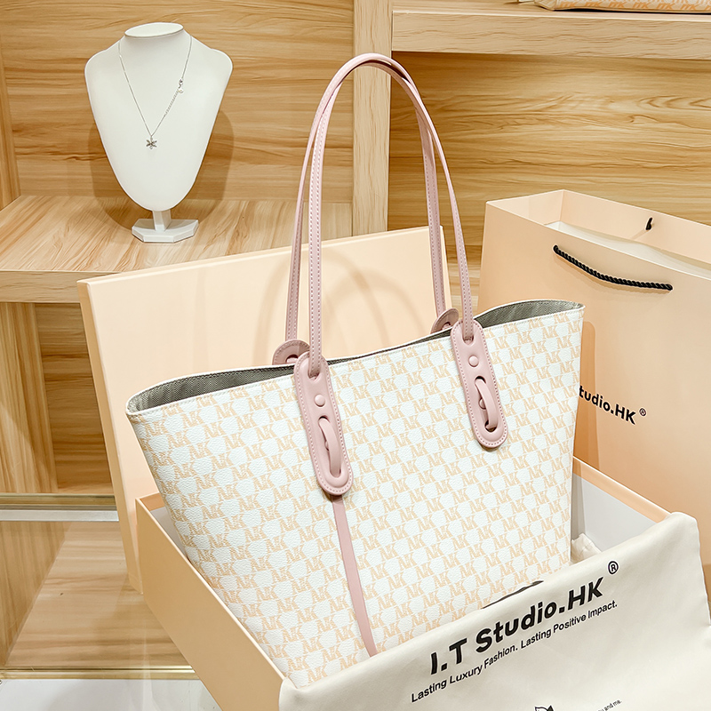 Hong Kong tote bag women's large-capacity leather portable commuter high-end shoulder bag large bag 2022 autumn and winter new style