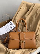 Classic casual European and American style temperament cowhide horseshoe buckle Kelly bag hand stitching contrast womens hand-held shoulder cross-body bag