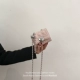 Розовый маленький мобильный телефон