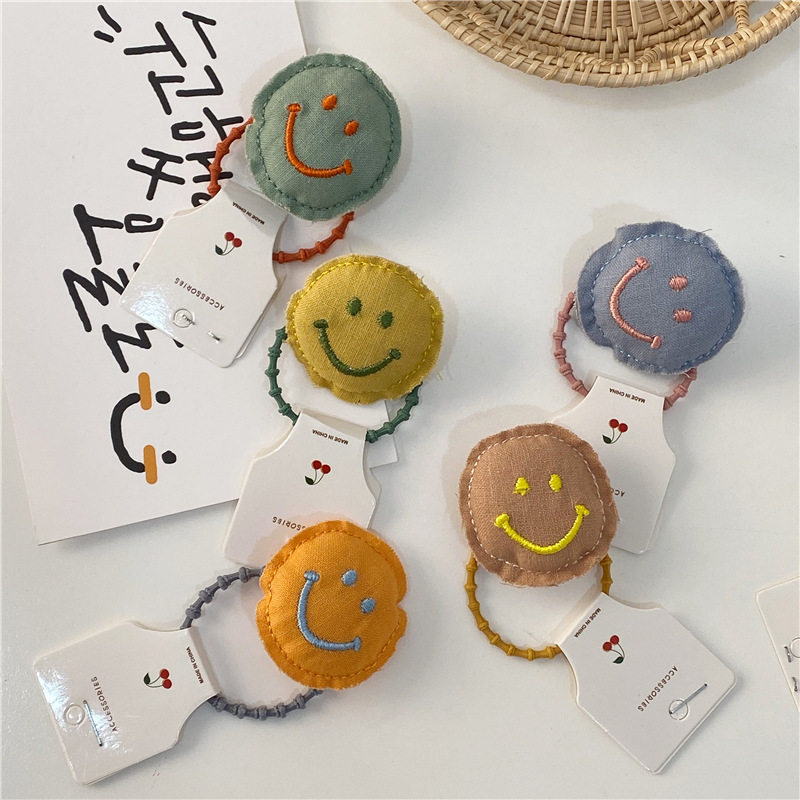 Sails Home Children's new cute cartoon Smiling Face Hair Circles Cloth Art Hair Circles Pellet Head Leather Fascia Thumb Head Rope Small Colored