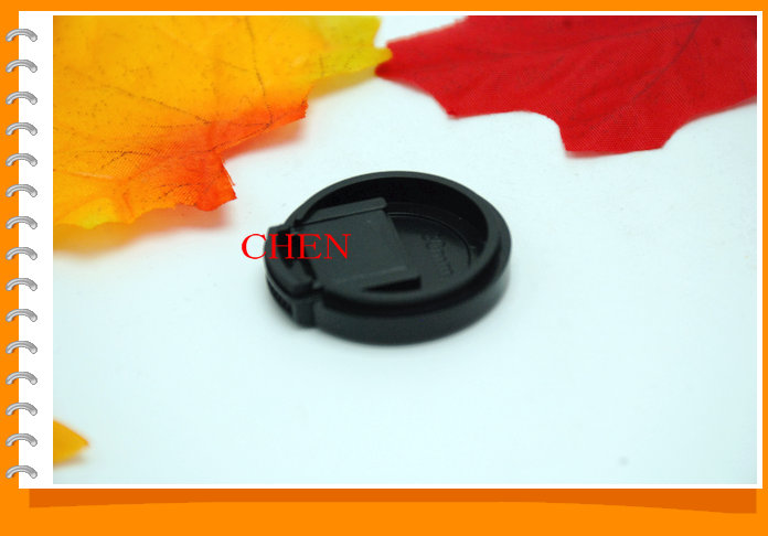 Ordinary lens cap 30mm universal type pinch the lens cap on both sides without words