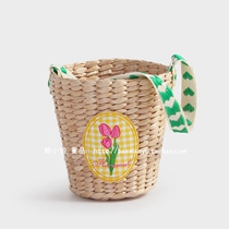 2022 summer new Korean children and girls hand-embroidered ball bow grass woven bucket bag handbag