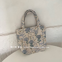 2022 new Korean inssen series literary fresh cotton and linen floral hand-held cloth bag cosmetic bag mummy bag