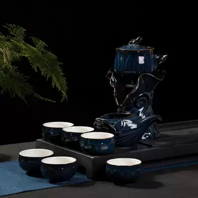 A complete set of semi-automatic Kung Fu tea set Household ceramic lazy stone mill tea making creative teapot Teacup Simple