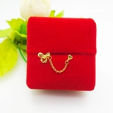 Золотые серьги с бантиком