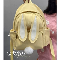 Желтая коллекция обращает внимание на отправку длинных подвесок для кроликов