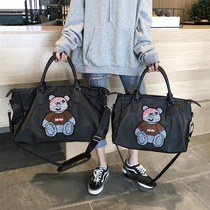 Travel bag female portable Korean version of large capacity travel bag short luggage bag men cross body light sports fitness bag tide