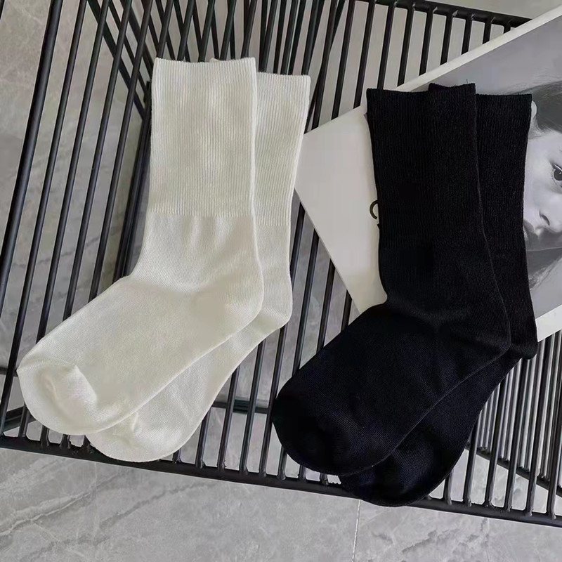 Show thin Hosiery children Autumn and winter ins pure cotton Simplicity Solid color European goods Chaopai black white Middle cylinder a lower leg Bubble socks