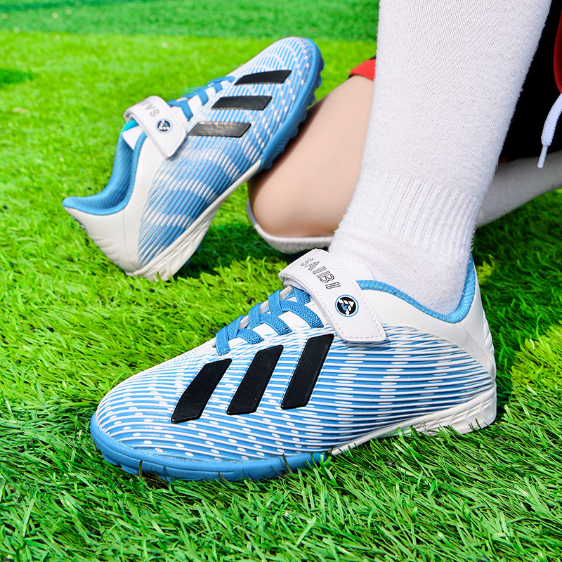 Huaqiang pull back children's soccer shoes broken nails boys and girls AG long nails TF broken nails C Luo assassin CR7 training shoes