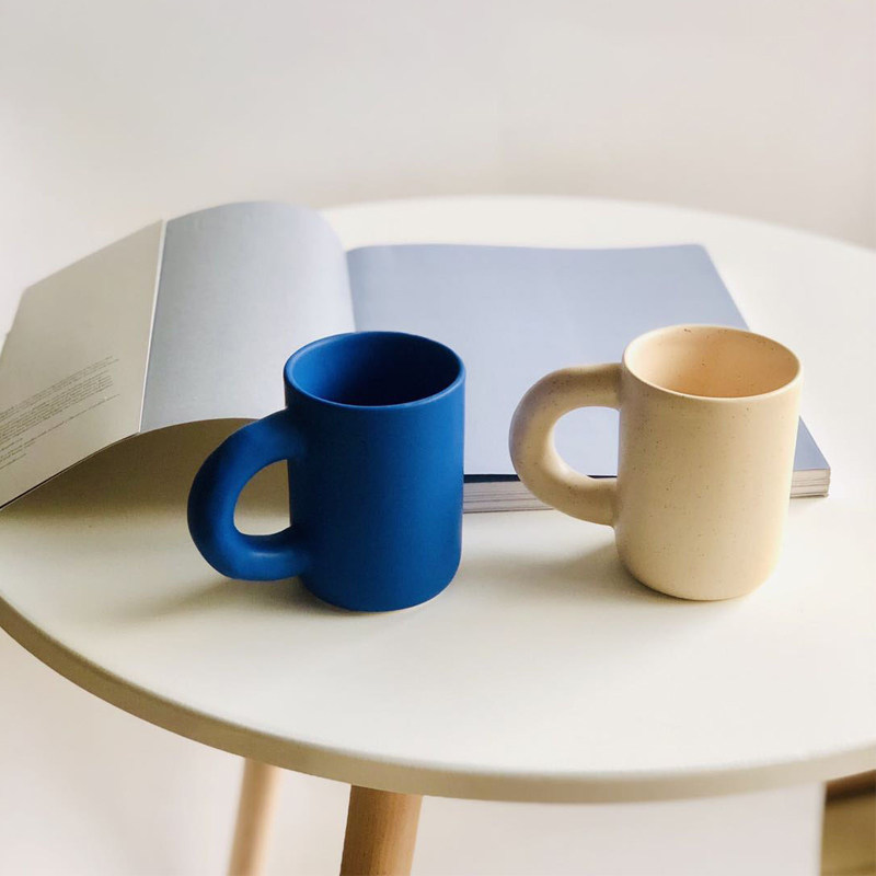 Korean niche designer thick handle white-collar little red book exquisite personality cute blue cream ceramic cup Nordic