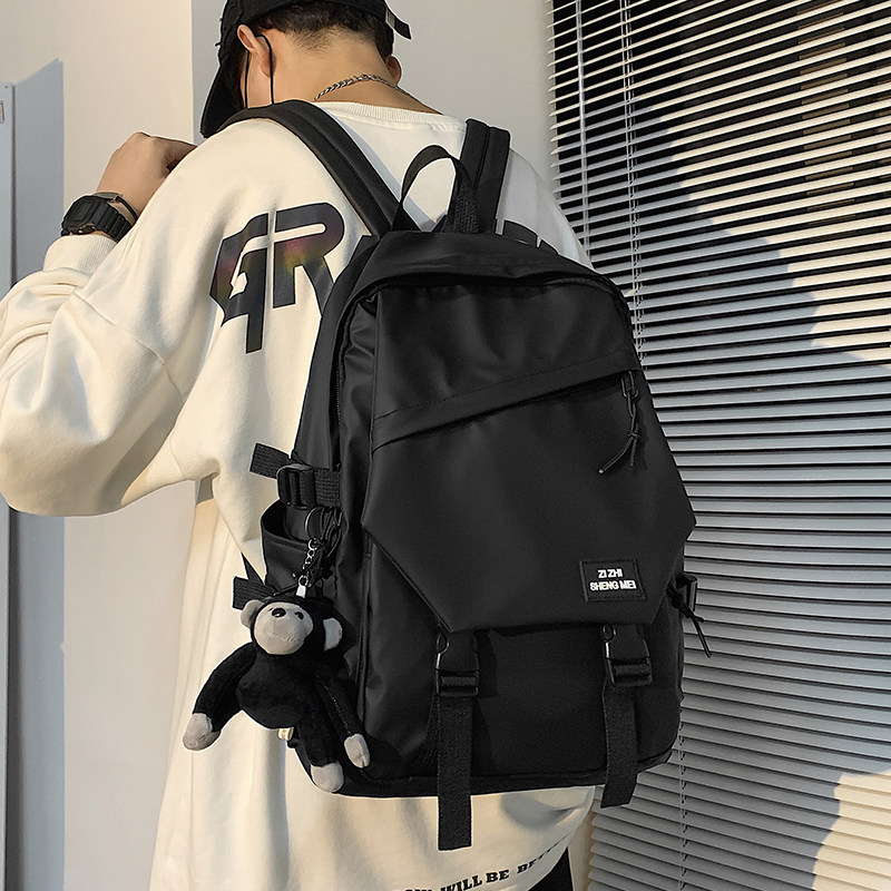 School bag men 2022 new fashion trend large capacity travel backpack female high school student college student casual backpack