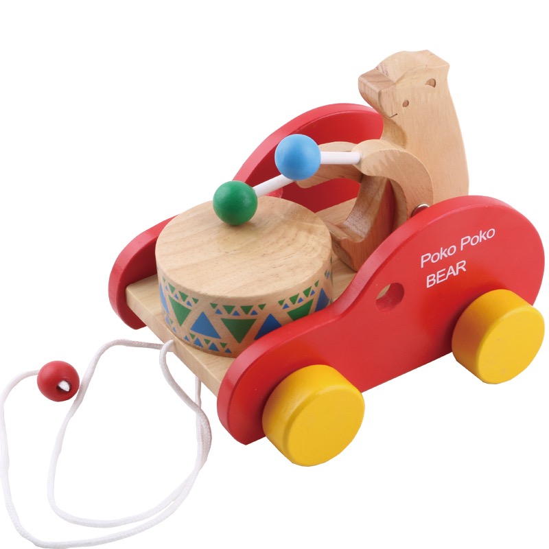 Foreign trade wooden bear towing car drumming on the ground dragging away the bear can play drums