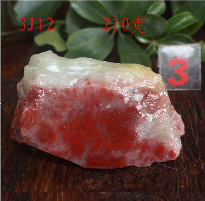 Guilin Longsheng Guilin Chicken Blood Jade hand play piece Ornament carving material Hirano raw stone 210g
