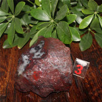 Guilin chicken blood Jade exquisite natural jade mouth material black black background red wool raw stone 0 91kg