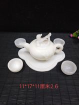 Exquisite Xinjiang white jade ornaments living room Xiuyan jade carving teapot jade ornaments ashtray new products strange stone head