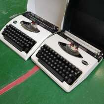 The object is good. English typewriter vintage can be printed and typed. Old-fashioned machinery can play the century window.