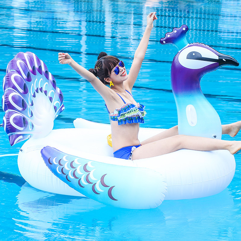 Super large peacock swimming ring inflatable mount female net red big floating bed floating drainage on the inflatable floating pad thickened floating bed