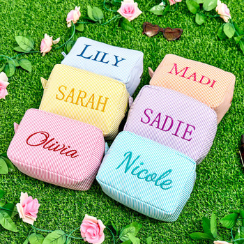 Custom embroidered seersucker striped cosmetic bag