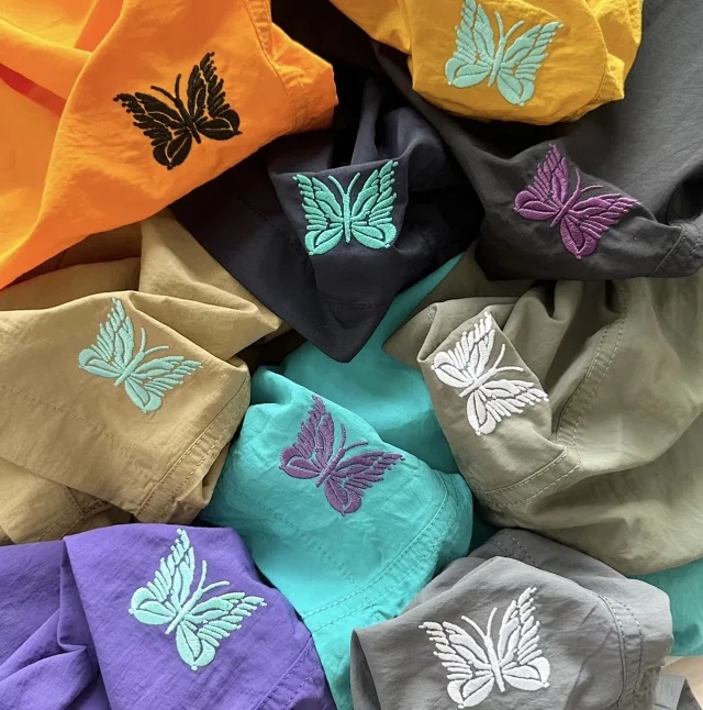 Dopamine Nine Butterflies Solid Color Embroidered Butterfly Japanese Trend Nylon Casual Straight Beach Shorts for Men and Women Dopamine Nine Butterflies Solid Color Embroidered Butterfly Japanese Trend Nylon Casual Straight Beach Shorts for Men and Women
