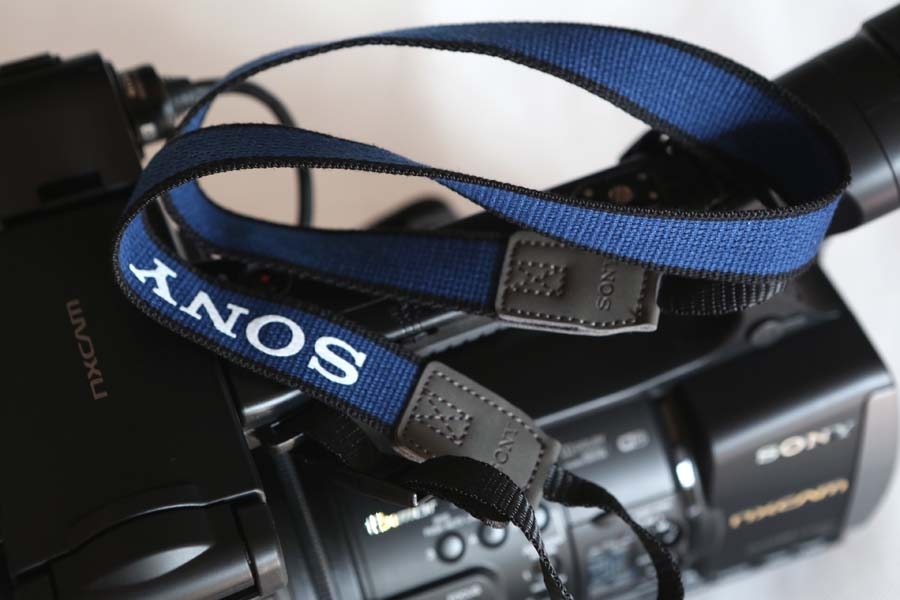 Sony dây đeo ban đầu máy ảnh DSLR dây đeo vai Micro đơn NEX6 NEX5R DV HD dây đeo máy ảnh chụp ảnh - Phụ kiện máy ảnh DSLR / đơn chân quay máy ản