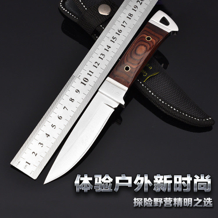 Mongolia hands the meat cleat with a small knife.