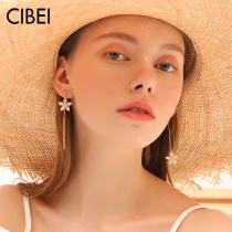 Round face thin asymmetrical tassel flower earrings female earrings New Tide temperament long silver earrings 2021