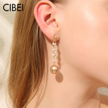 Advanced sense round face earrings retro harbor style baroque pearl earrings female long temperament earrings 2021 New Tide