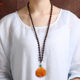 Long water drop beeswax sweater chain necklace for men and women ethnic style amber high-end sandalwood beads necklace clothing pendant