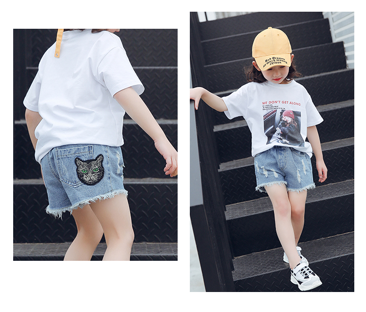 Quần short denim trẻ em mặc mèo đầu thêu mùa hè nóng quần ở trẻ em phần mỏng lỗ bông cô gái lỏng lẻo quần