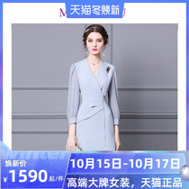 High-end foreign style dress female mid-length 2021 Spring New temperament goddess Fan v collar one step skirt trend