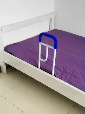 The old man gets up to help the white armrest bedside guardrail to keep warm. The wrench helps the night tool to be fixed and installed.