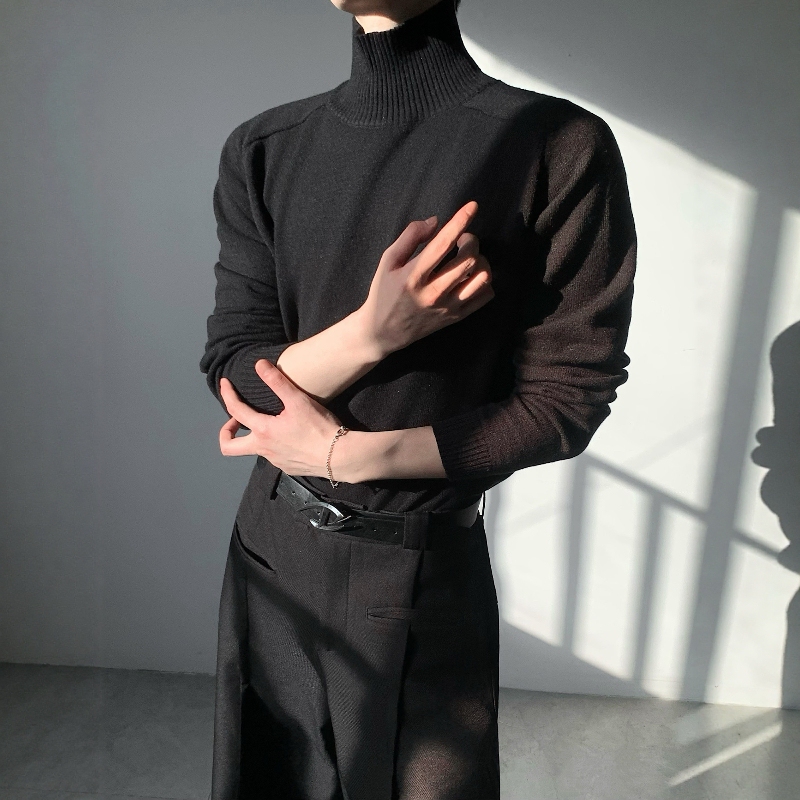 Black Turtleneck Sweater with a High-End Minimalist Style for Men, Featuring a Textured and Stylish Design