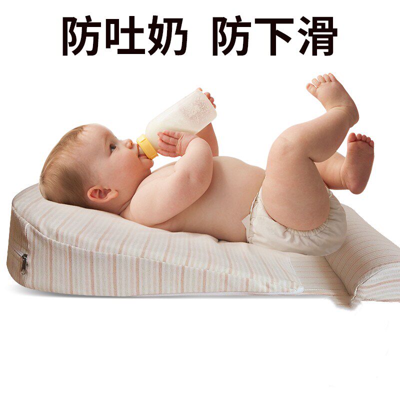 The breast - feeding baby baby anti - spitting milk slope pad 0 - 1 year old baby stereotyped pillow newborn anti - spill milk function