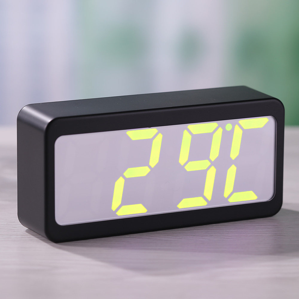 Simple small alarm clock alarm modern creative student electronic children silent bedhead night clock digital discoloration
