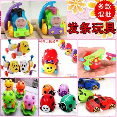 Baby stalls exploding creative cartoon on the chain flip bucket small toys clockwork toys children's creative toys