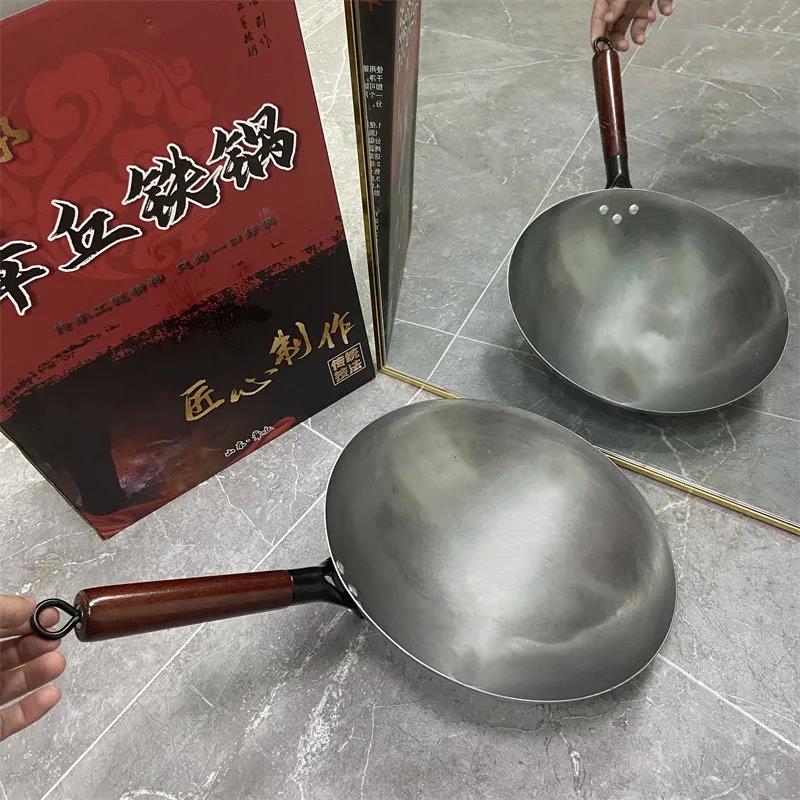 Please remember that not all pots are called Zhangqiu Iron Pot Kitchen Home Uncoated Wood Handle Wok