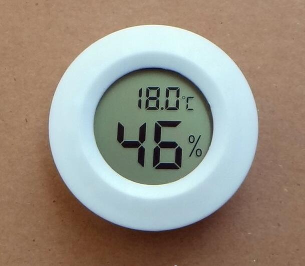 Circular electronic temperature and humidity meter reptile electronic temperature and humidity meter mini electronic digital display temperature and humidity meter