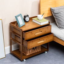 Bedside table Simple modern mini light luxury storage small cabinet Creative ornaments Table lamp shelf with wheels can be moved