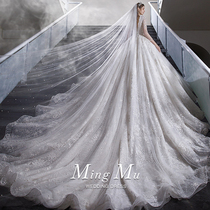 Long sleeve fasting wedding dress 2021 new bridal high level palace windy high end luxury heavy work drag tail wedding staple yarn