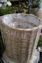 Promotional original single American wicker set of two round storage baskets flower baskets and plant baskets with a waterproof plastic layer on the inside