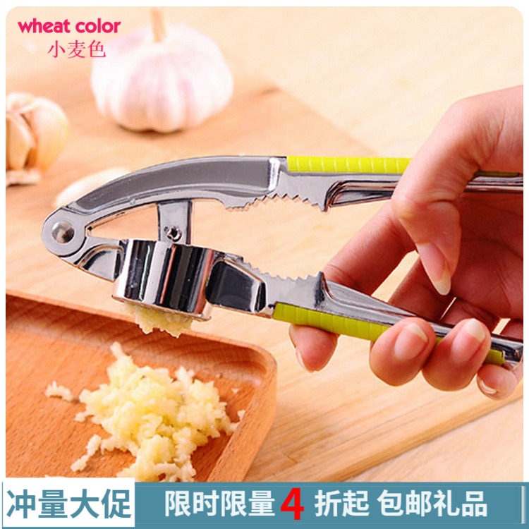 Multi-functional garlic press garlic peeler manual cutting and squeezing garlic garlic mashed stainless steel garlic walnut clip