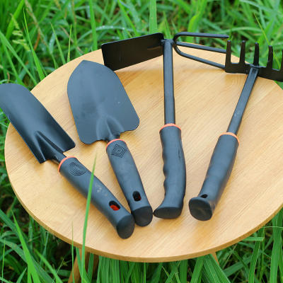 Black rubber-handled gardening tools such as shovels, hoes, and harrows, extra-large vegetable planting shovels, harrows, shovels, spades, and hoes, as well as garden and agricultural tools