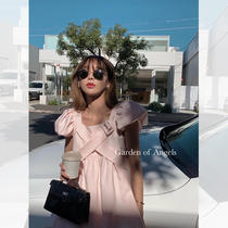 Shi Weiliang three-dimensional relief French pinch pleated cross belt design sense thin bubble sleeve puffy dress flower skirt