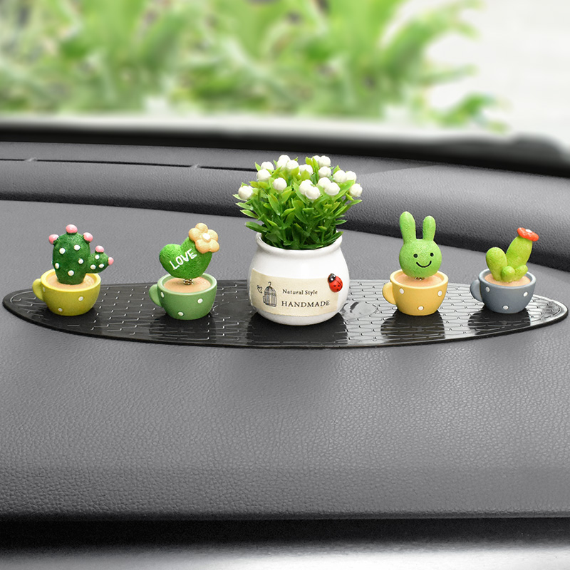 Car-mounted personality car decorations cute female net red car console beautiful shaking head small plant
