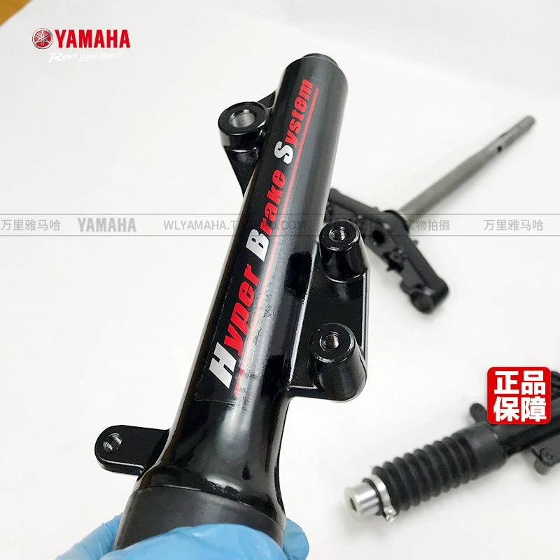 Đại bàng Yamaha / YAMAHA đại bàng vẫn cổ áo ZY125T giảm xóc trước phuộc lắp ráp cột Samsung thấp hơn - Xe máy Bumpers