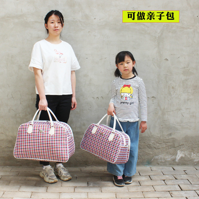 Classic waterproof large capacity hand luggage bag Women's long-distance clothes travel storage bag Men's travel parent-child bag