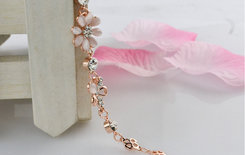 Thời trang Nhật Bản và Hàn Quốc vòng tay hoa dại nữ 18K vàng hồng vòng tay trang sức phụ kiện quà tặng đôi thạch anh tóc đen
