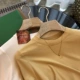 Желтый лонгслив с круглым воротником